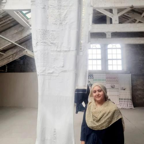 Photograph: Izzie Smith | Nabeela Ahmed with her poetry on Layering Cultures 