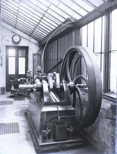 Photograph: Bradford Museums & Galleries | Crossley gas engine in the potting shed driving a dynamo at Milner Field